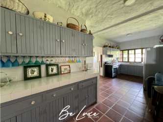 Covered beachfront terrace with ocean views hammock BBQ bar tropical garden