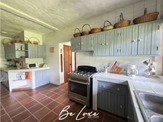 Bright open concept living room with pool view ocean breeze Panama beach villa