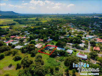 Drone shot of marked property lot and unfinished hostel building in Bejuco near Chame Panama