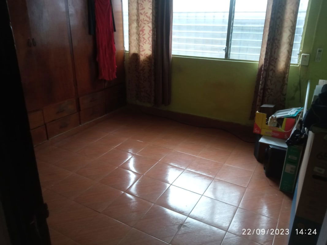 Spacious living and dining room with tile flooring, wooden furniture and ceiling fan in San Francisco Panama