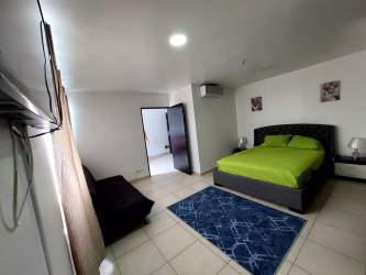 Large swimming pool facing ocean at OceanView Playa Corona San Carlos Panama