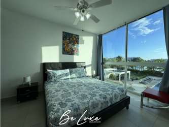 Balcony with seating and view of saltwater lagoon Playa Blanca Panama