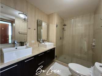 Furnished living room with sliding doors to balcony, lagoon view at Playa Blanca