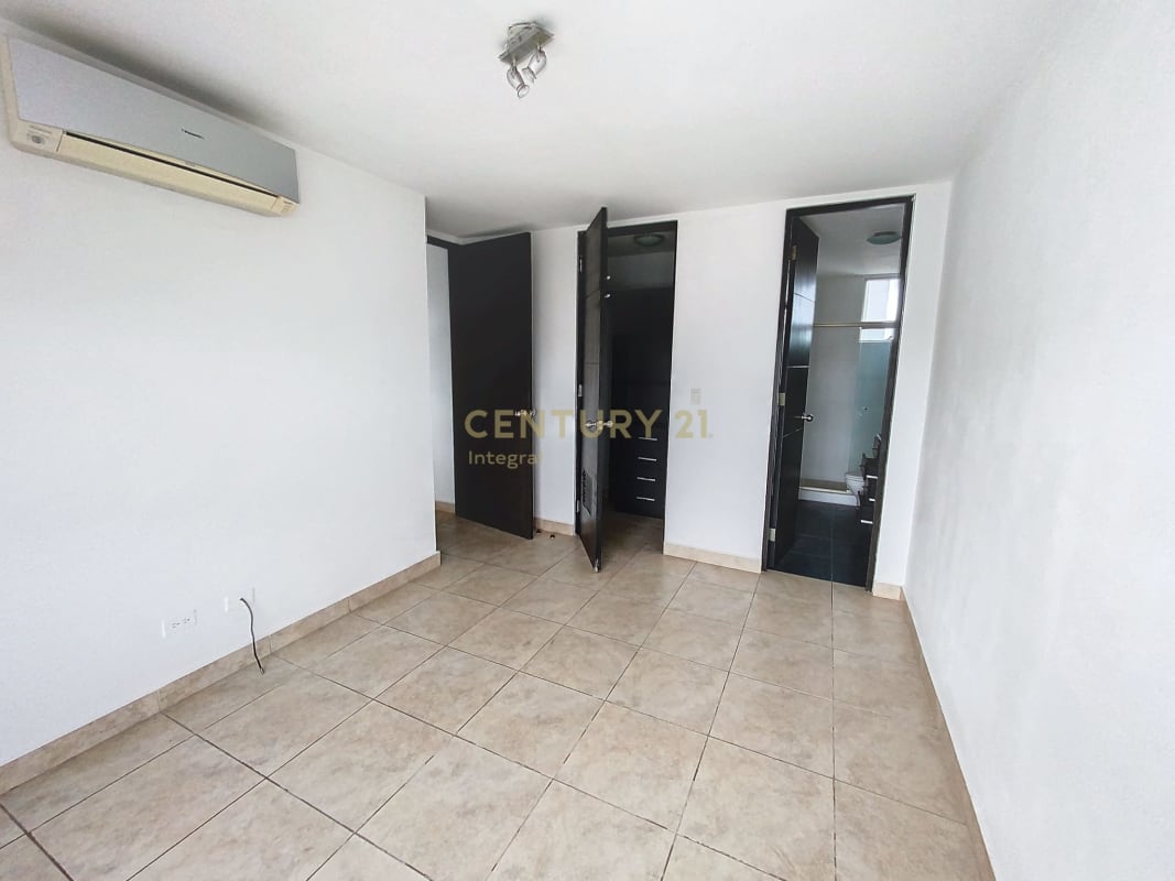 Bedroom with large windows and skyline views in PH Kubic El Cangrejo Panama