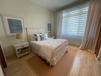 Contemporary bedroom with large window garden views Buenaventura Panama luxury villa