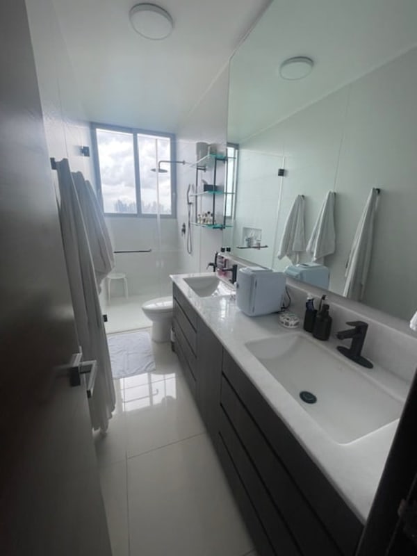 Spacious living room with large balcony and ocean views at PH Bali Costa del Este Panama