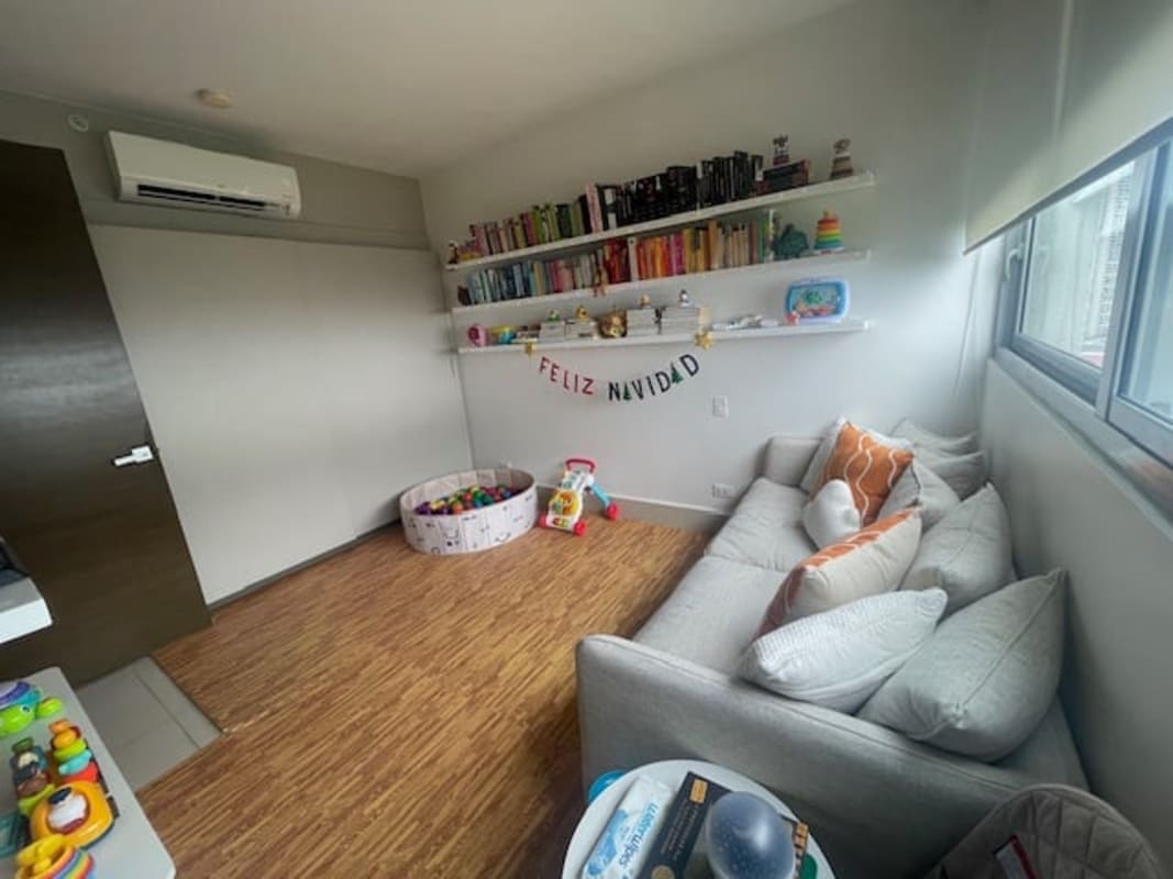 Contemporary gym with large windows and garden views in PH Bali Costa del Este Panama