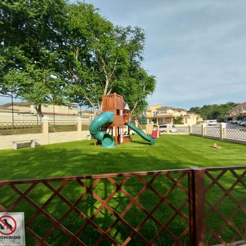 Large swimming pool with slides and waterfall Dorado Springs condominiums Panama