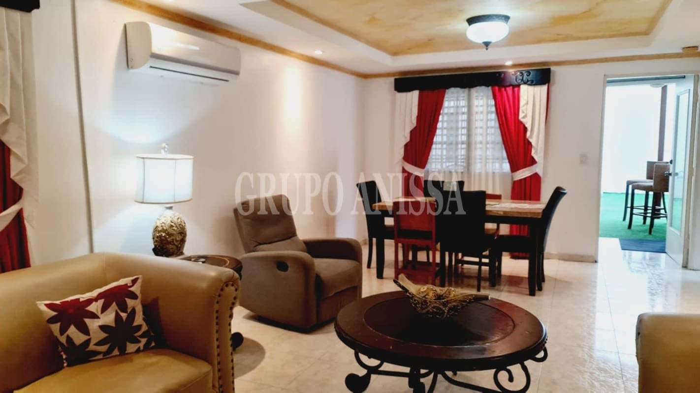 Large open living and dining area with tile floors, ceiling fan, and natural light Palma de Mallorca Villa Zaita Panama City