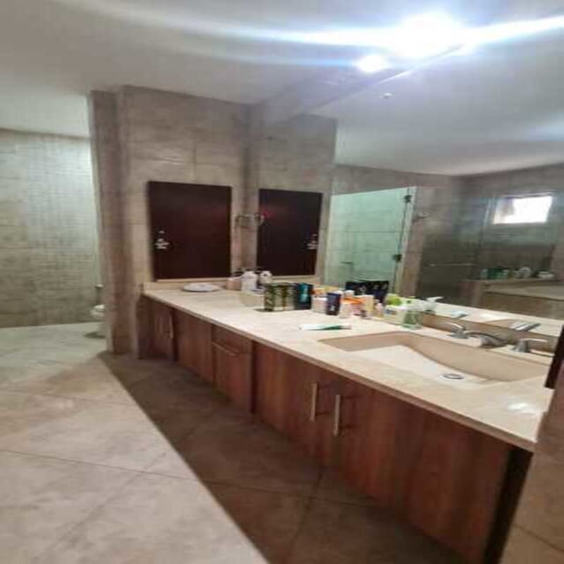 Contemporary bathroom with modern vessel sink and mirror Embassy Club Panama City