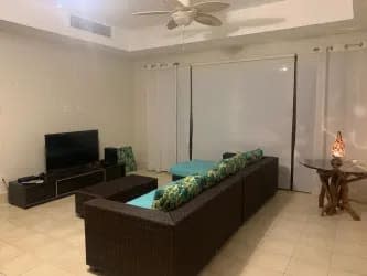 Contemporary bathroom with glass shower and beige tiles rental Buenaventura Panama