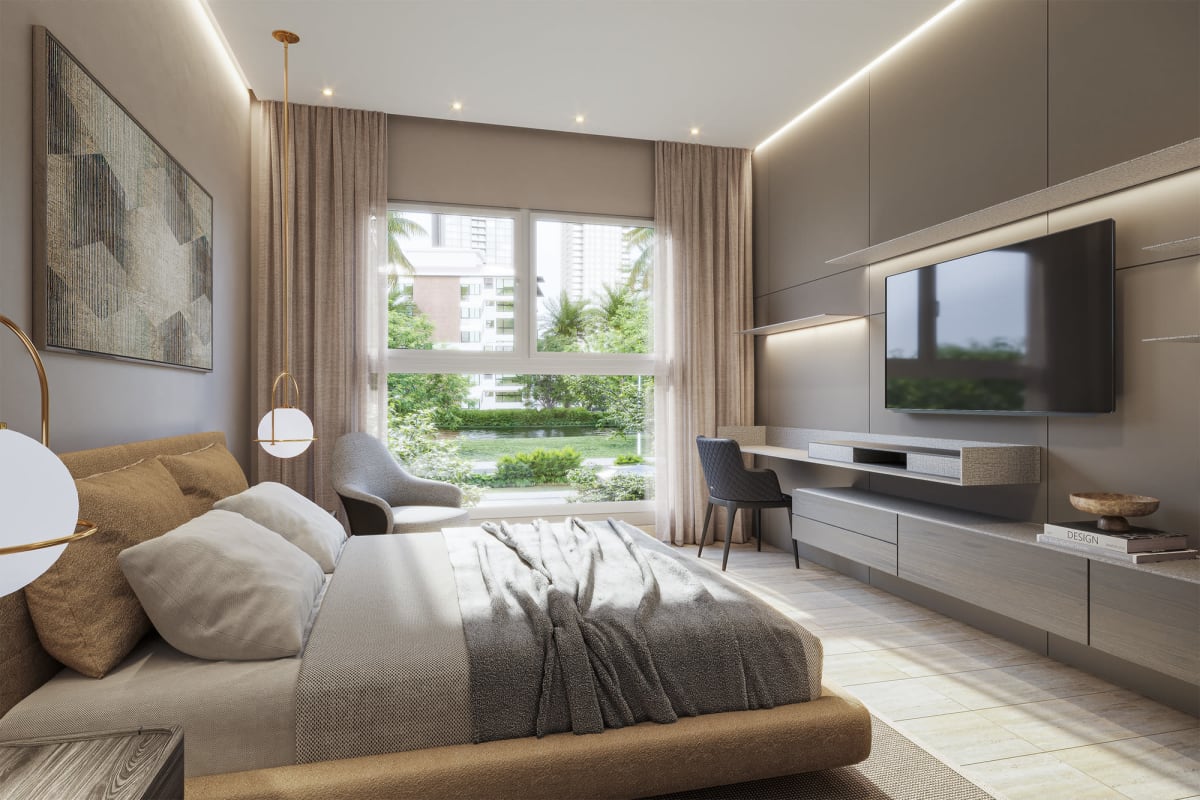 Kitchen with wood cabinetry and stone countertops open to dining area at The Woods Panama