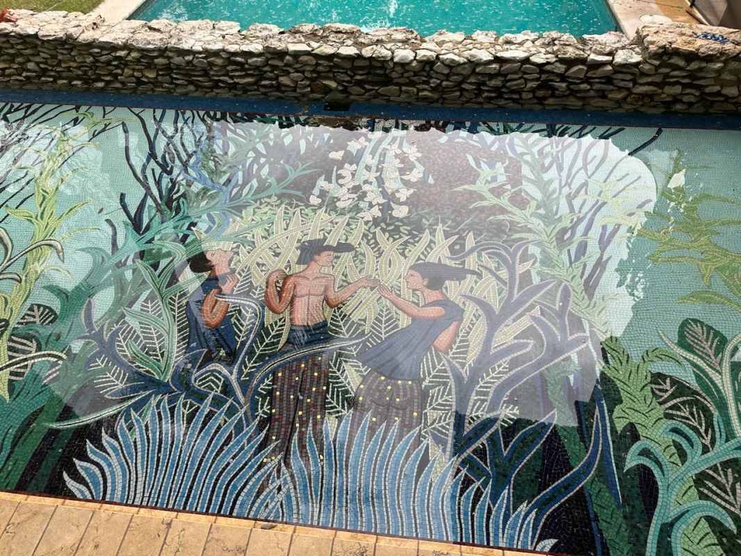 Traditional living room with chandelier and large glass doors luxury Panama house