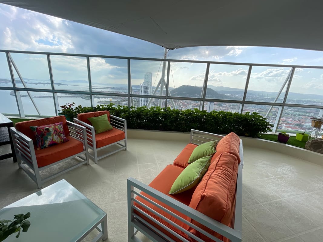 Balcony terrace overlooking Panama Bay and skyline Yacht Club luxury penthouse