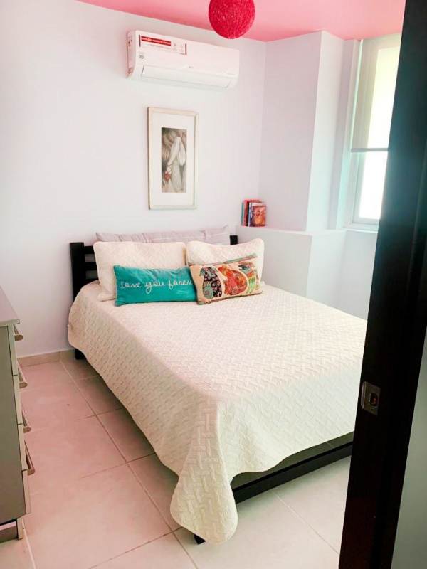 Contemporary bedroom with colorful decor, AC, built-in closet PH Bay View Panama City Oceanfront Condo