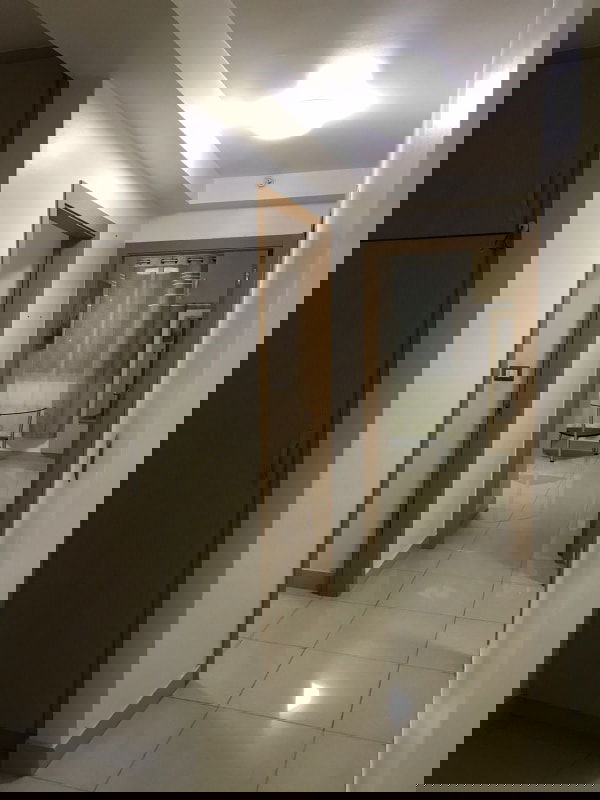 Hallway with storage cabinets in PH Rokas Condado del Rey apartment Panama