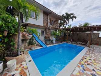 Two-story tropical house with lush landscaping and private pool area Nueva Gorgona Panama