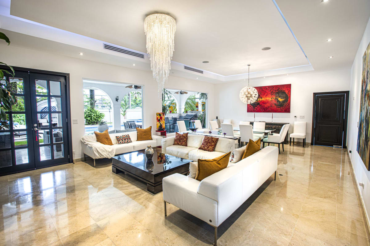Spacious open plan living dining with marble floors in Costa del Este luxury home