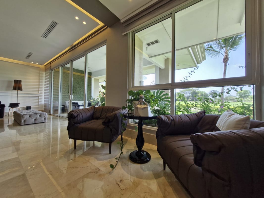 Large private covered terrace with garden and golf course views in The Reserve Santa María Panama