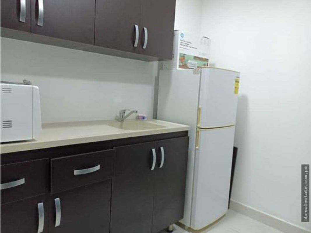 Elegant lobby area with marble floors and multiple elevators in Torre Ancón Costa del Este