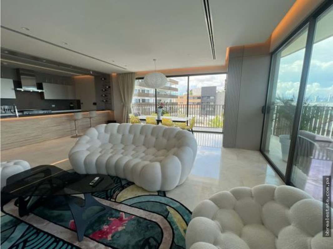 Curved waterfront balcony with seating and panoramic ocean view PH Seascape Island Punta Pacifica Panama