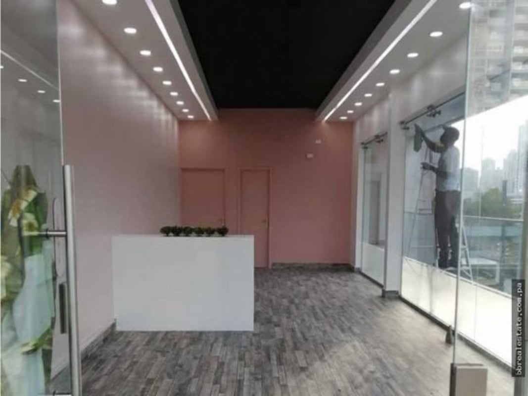 Retail or office interior with glass entry and windows, recessed lighting, Midtown Plaza Panama City