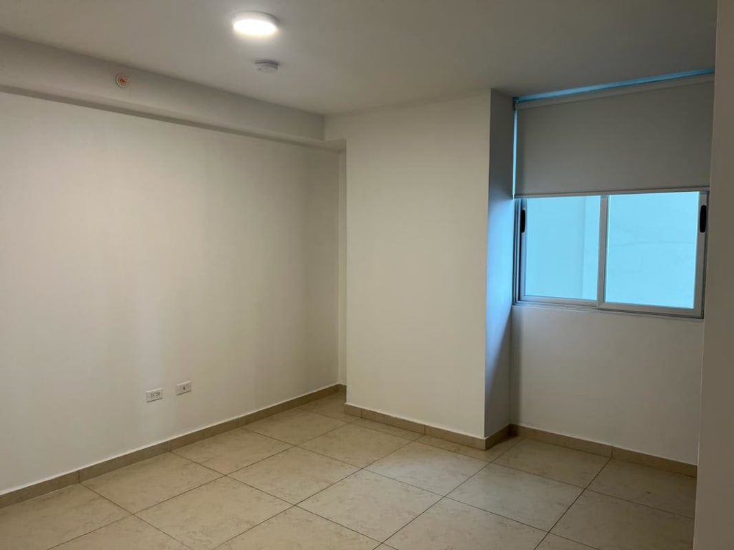 Bedroom with large windows and Pacific Ocean views at PH Lumiere Costa del Este Panama