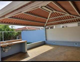 Bathroom with pedestal sink, shower enclosure, beige tiles house La Chorrera Panama