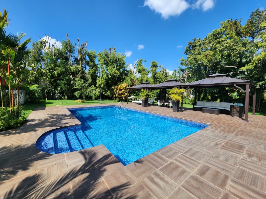 Spacious study or office with built-in cabinetry and garden views in luxury Altos del Golf property Panama