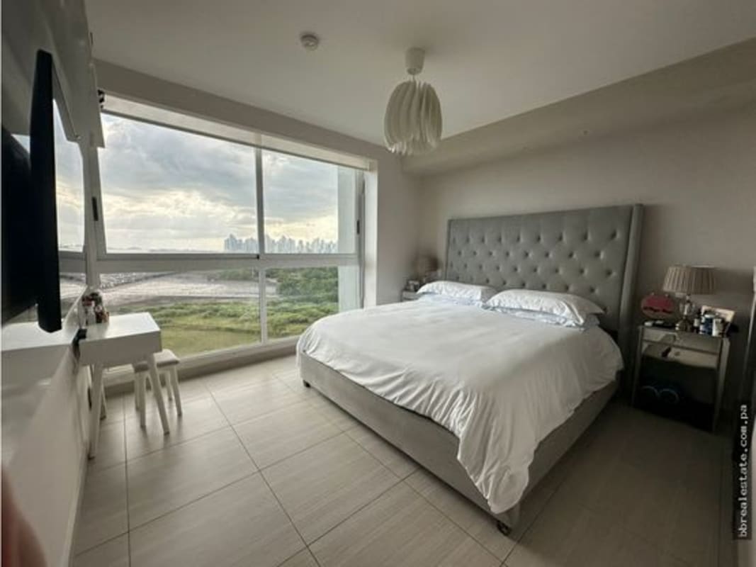 Modern bedroom with skyline and green views, PH Asia Costa del Este
