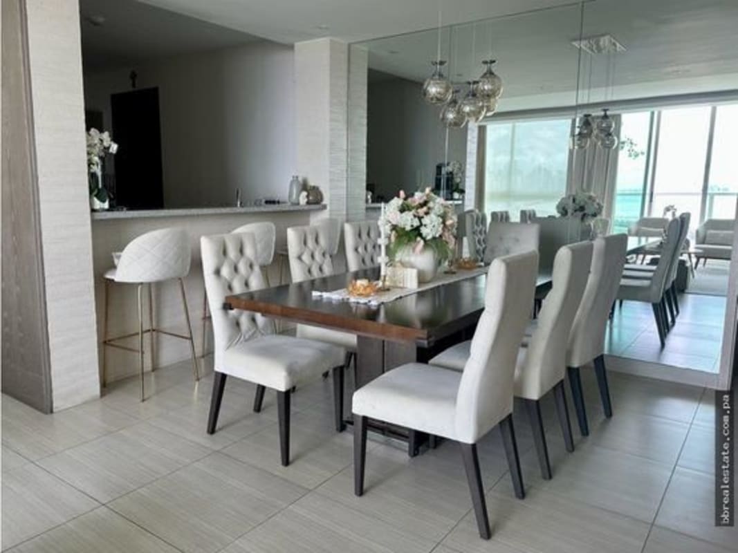Modern dining area with large mirrors and ocean panorama PH Asia Costa del Este