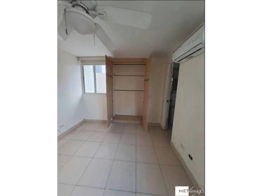 Minimalist bedroom tile floor open wardrobe split AC window PH Mirador Siena Panama City