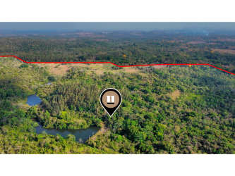 Drone image of 150 hectares property with river frontage, wooded areas and development land La Chorrera Panama