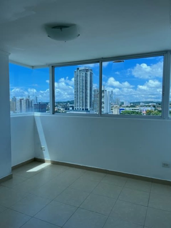 Minimalist bedroom with wooden built-in wardrobe ceramic floors PH Altavista Tower Panama