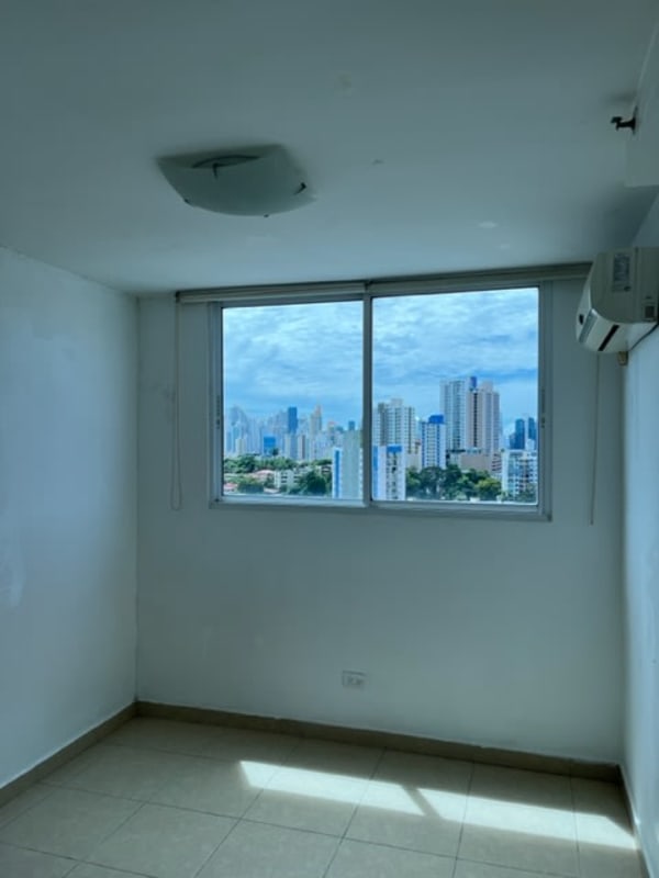 Living room with large sliding doors to balcony panoramic view PH Altavista Panama