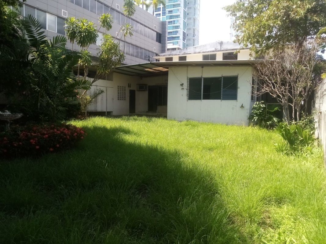 Lush landscaped garden with fountain in upscale Altos del Golf residential Panama City