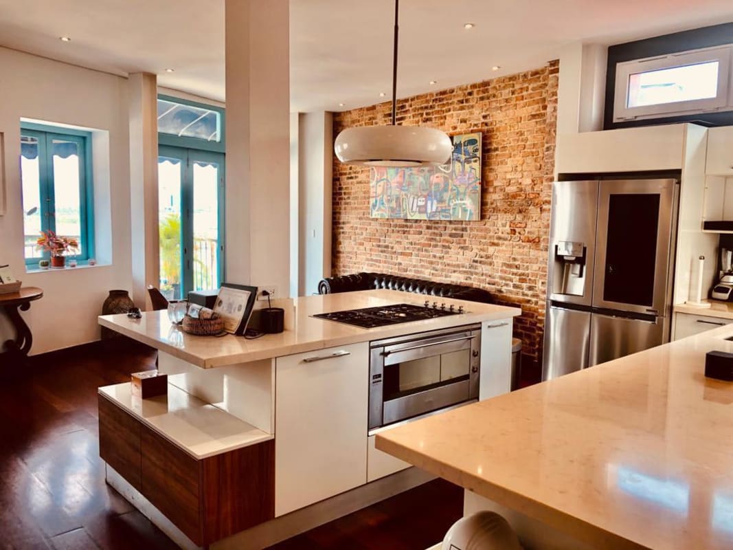 Kitchen with island and pendant lights Casa Jeronimo Casco Viejo Panama