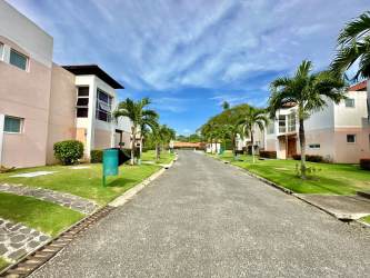 Modern two-story homes with tropical landscaping in Villas de Camarón Rio Hato Panama