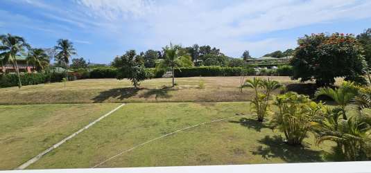 Spacious living and dining room with large windows sliding doors modern furniture Villas de Camarón Rio Hato Panama