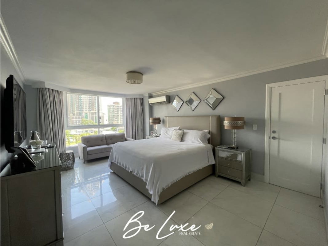 Large bedroom with panoramic window view of Pacific Ocean Punta Pacífica Panama