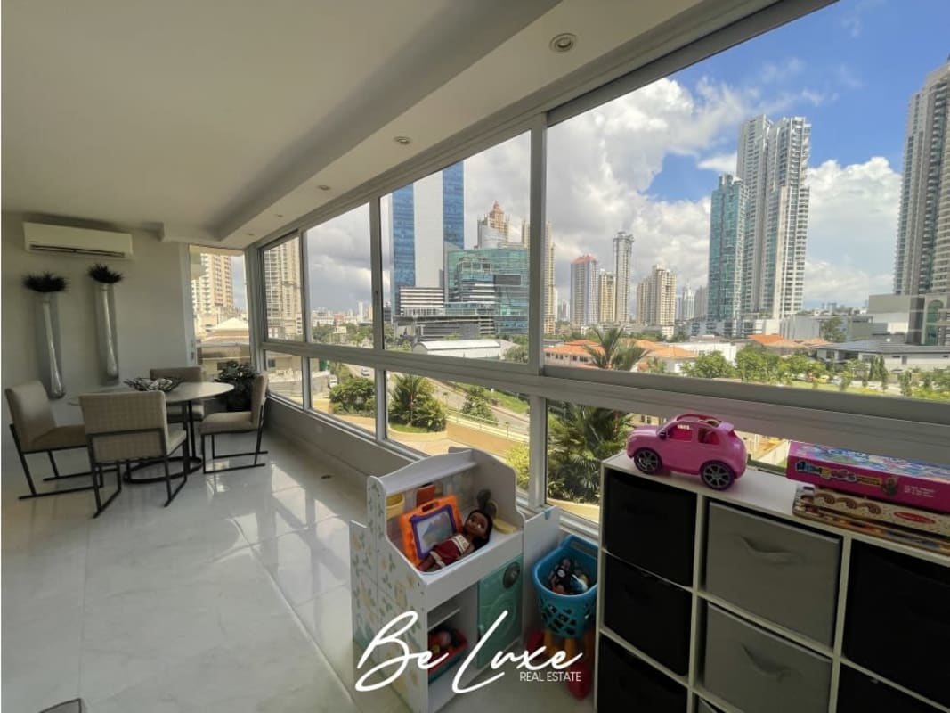 Kitchen featuring stainless appliances, white cabinetry, black counters in Punta Pacífica Panama