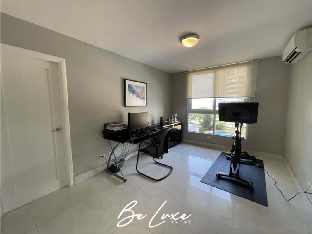 Multi-purpose room configured as home office and gym space in Punta Pacífica Panama