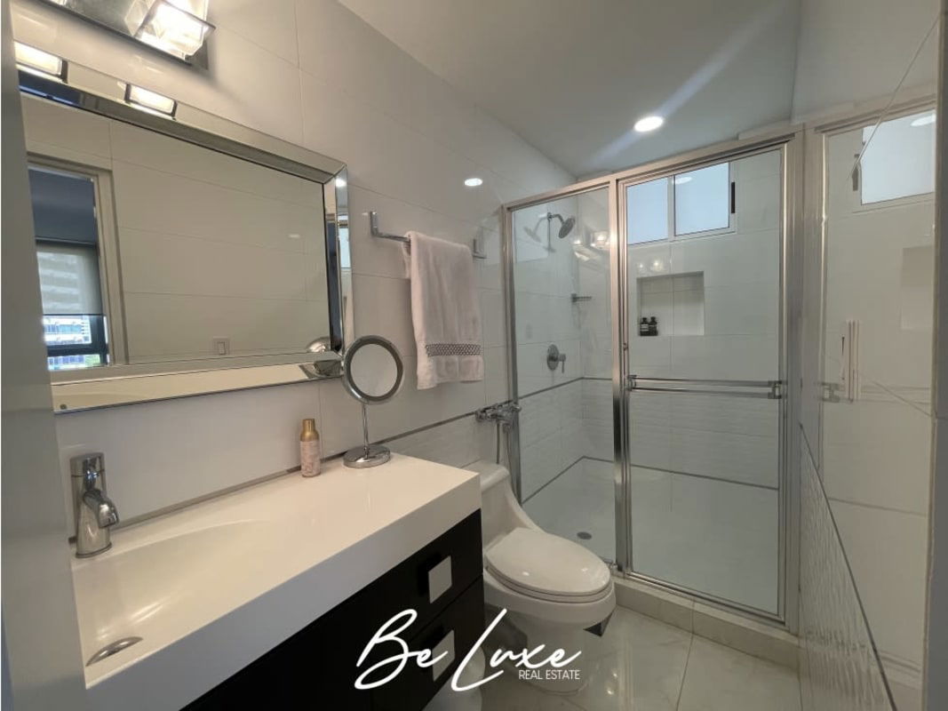 Charming children's bedroom with floral wallpaper and city view Punta Pacífica Panama