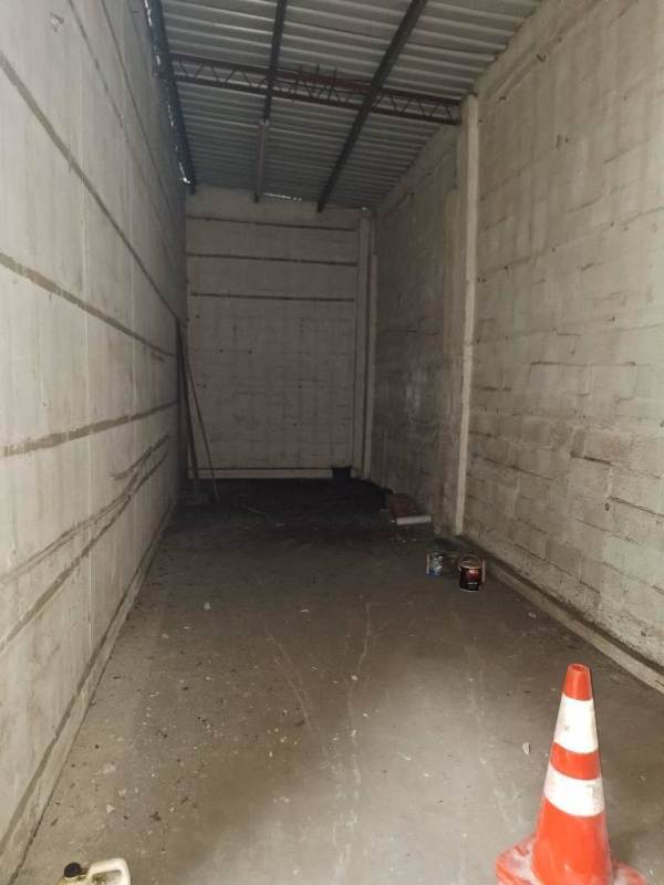Large unfinished storage room inside industrial warehouse in Juan Diaz Panama