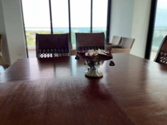 Spacious modern bedroom with large windows and minimalist design in Vista Mar Beach Panama condo