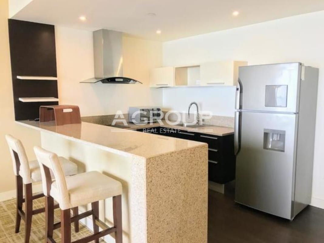 Spacious master bedroom with large windows ocean view Waldorf Astoria residence Panama