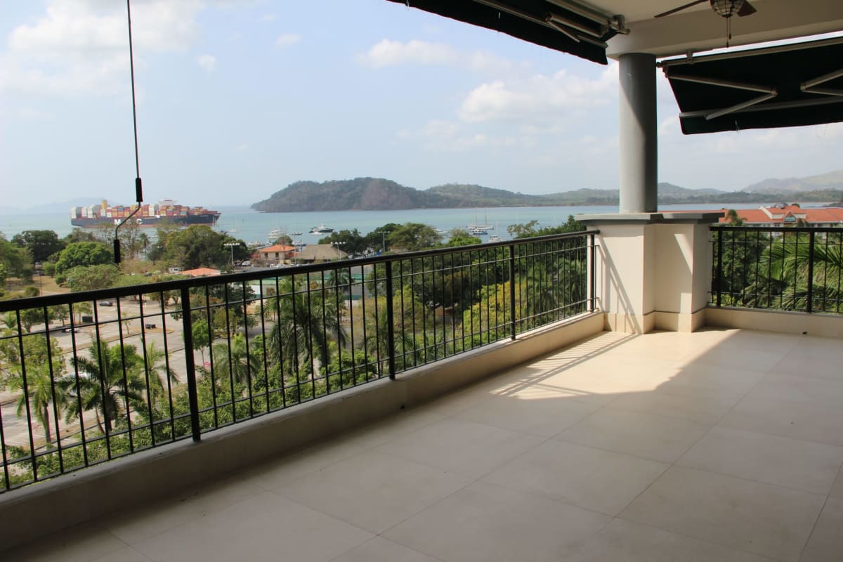 Living room with large windows overlooking the Panama Canal from Altos de Amador Panama