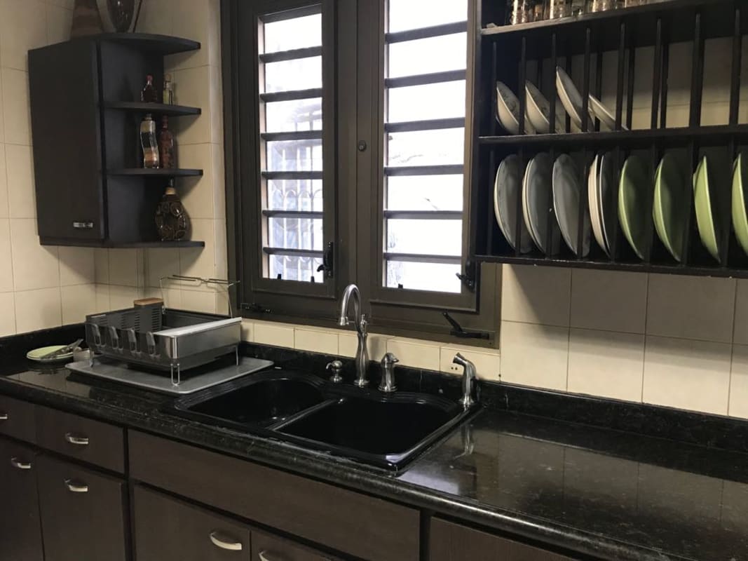 Kitchen with granite countertops and double sink Dos Mares villa Panama
