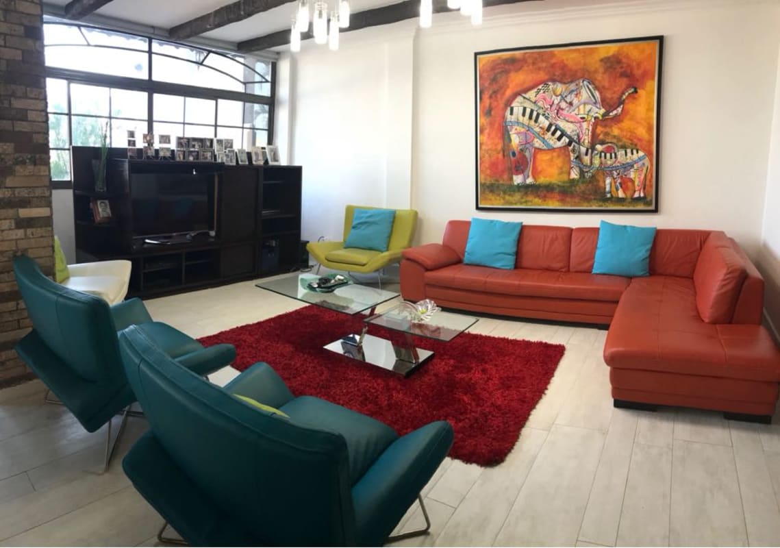 Traditional luxury living room with chandelier and crown molding Dos Mares Panama