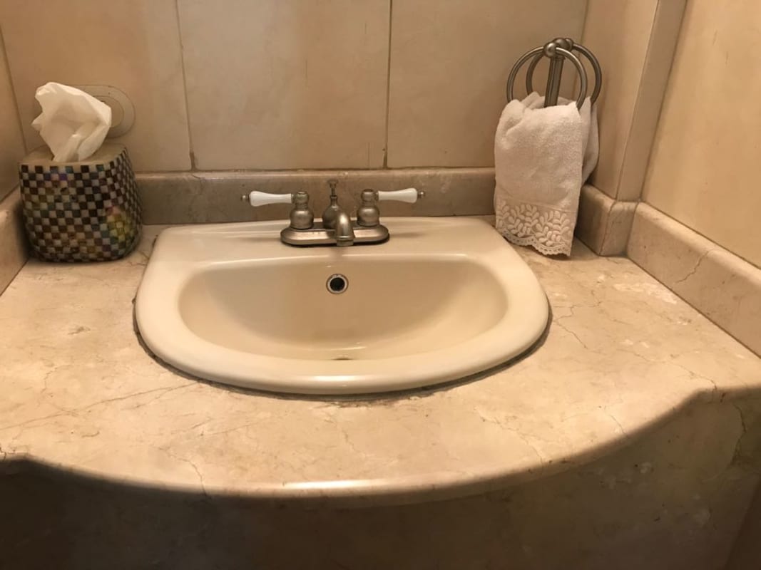 Marble bathroom counter with ceramic sink Dos Mares residence Panama